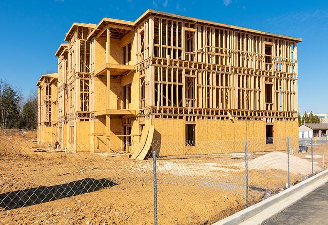 a snapshot of temporary chain link fences protecting a large construction project from unauthorized access in Ellensburg